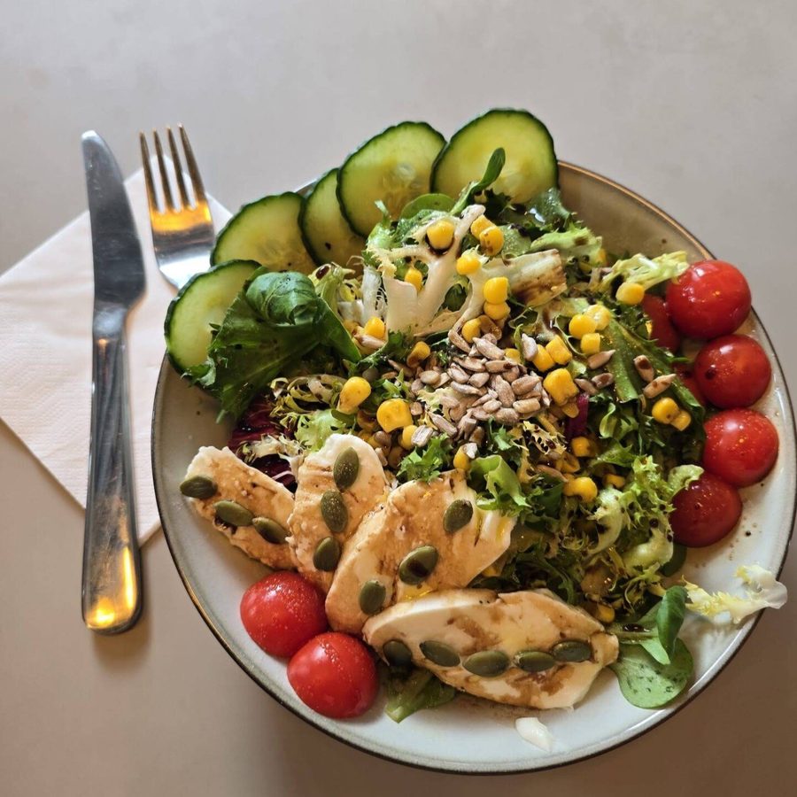 Chopped chicken salad with tomatoes, cucumber and sweetcorn