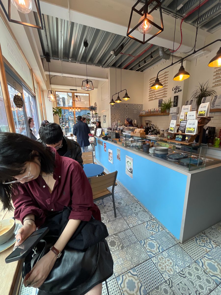 The counter and pastry cabinet inside Café Saffron