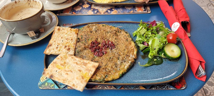 Kookoo sabzi herb frittata scattered with barberries