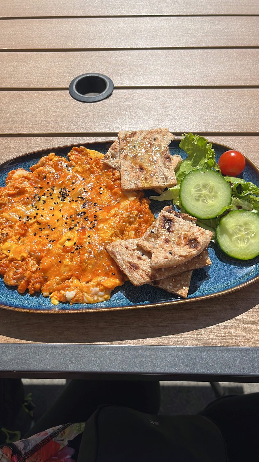 Mirza ghassemi, smoky aubergine and egg, served with flatbread