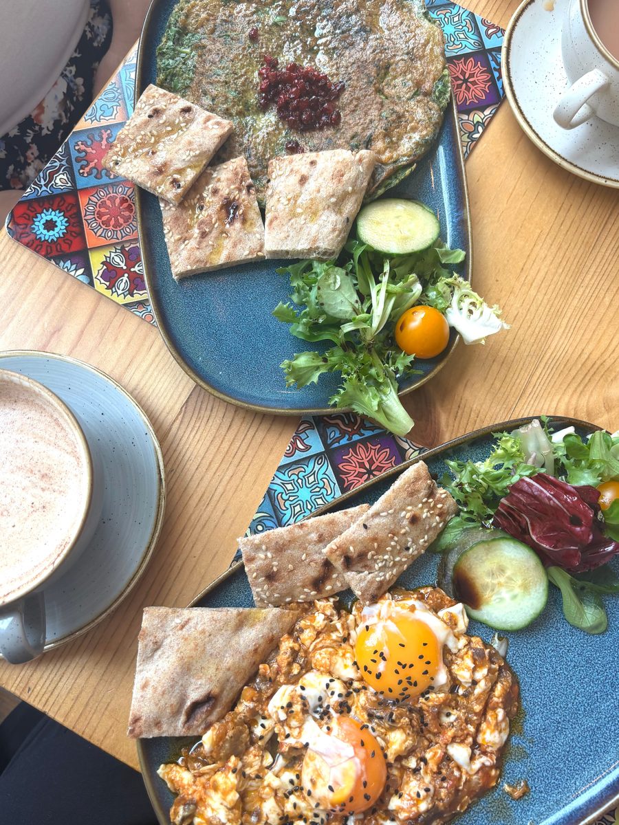 Breakfast spread with sangak flatbread, egg and salad